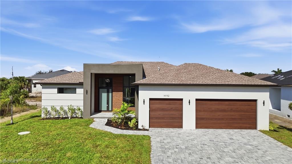 Experience luxury waterfront living in this brand-new custom-built home located in the desirable South Gulf Cove community with boating access to the Gulf. Designed with modern elegance and comfort in mind, this stunning residence features soaring ceilings, abundant natural light, floor-to-ceiling windows, designer wood-look tile flooring, and an open-concept layout perfect for entertaining.

The chef’s kitchen offers quartz countertops, stainless steel appliances, custom cabinetry, a walk-in pantry, and a waterfall-edge island with upscale finishes throughout. The spacious primary suite includes lanai access, dual walk-in closets, and a spa-inspired bathroom featuring dual vanities and an oversized walk-in shower with two shower heads. Each guest bedroom features its own private ensuite bath, while an additional half bathroom conveniently serves the main living area and guests.

Enjoy Florida living year-round from your private outdoor retreat complete with a heated pool and spa, covered lanai, summer kitchen, outdoor shower, panoramic screen enclosure, and expansive paver deck.

Additional highlights include hurricane-impact windows and doors, an oversized three-car garage, designer furnishings included, and the potential for future dock and lift installation. Seller is open to negotiating the installation of a custom dock and boat lift.

Located in a community with no CDD fees and minimal HOA dues, this exceptional property offers both flexibility and value. Conveniently situated near Boca Grande Beach, Manasota Key, Wellen Park, golf courses, dining, shopping, and world-class boating and fishing, this home delivers the ultimate Florida coastal living experience.