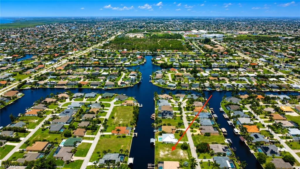 Oversized Gulf Access Waterfront Lot – Build Your Florida Dream Home
Discover the perfect setting for your custom waterfront home on this oversized Gulf access lot in one of Cape Coral's most desirable neighborhoods. The lot is nestled on a quiet dead-end street surrounded by beautiful waterfront homes on both sides of the street. The oversized lot offers added privacy and flexibility for larger floor plans, generous garages, or lush landscaping. Situated on a wide canal with direct boating access to the Gulf of Mexico. With the quick boat access, you'll have easy navigation to open water, world-class fishing, white-sand beaches, and waterfront restaurants.
Conveniently located near shopping, dining, golf courses, parks, and top-rated schools, this is a rare opportunity to own one of the area's premier waterfront homesites.