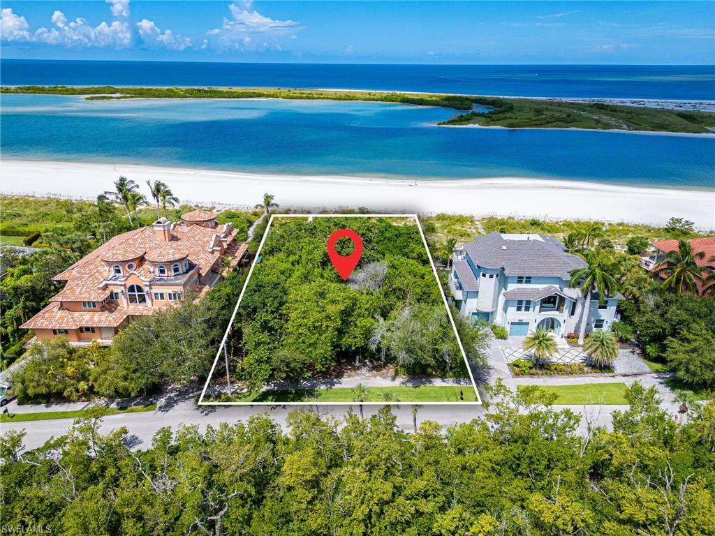 Welcome to the last available beachfront lot on Marco Island and in the prestigious Hideaway Beach Club . Imagine building your dream retreat on the pristine white sands, with breathtaking views of the crystal blue Floridian waters. Hideaway Beach is a private gated community that offers an unparalleled lifestyle with 2.5 miles of private beach, a newly remodeled Beach Club, beachfront dining, and over 150 acres of protected preserve. The acclaimed executive chef prepares several menu options, including fine and casual dining, served at four different venues, all with beach views.  Indulge in golf, a fitness center, tennis, pickleball, bocce ball, croquet, kayaking, paddleboarding and more. The new Sports and Wellness Center is under construction and will be completed in Fall 2025.  It will offer full fitness including 4 group exercise rooms, 5 virtual reality golf hitting bays, cafe, pro shop and massage rooms. Join Hideaway Beach, the Neighborhood on the Beach, and experience coastal luxury at its finest!  Experience the epitome of luxury coastal living in this private oasis! This exceptional opportunity comes with approved site plans, environmental clearances, and permits for a custom-designed JMDG home to save you time and costs to start your dream home.