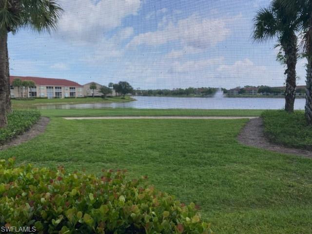Amazing lake views await in the bundled golf community of Cypress Woods. This first floor condo is light, bright and ready for occupancy! Having your own garage is an added bonus.