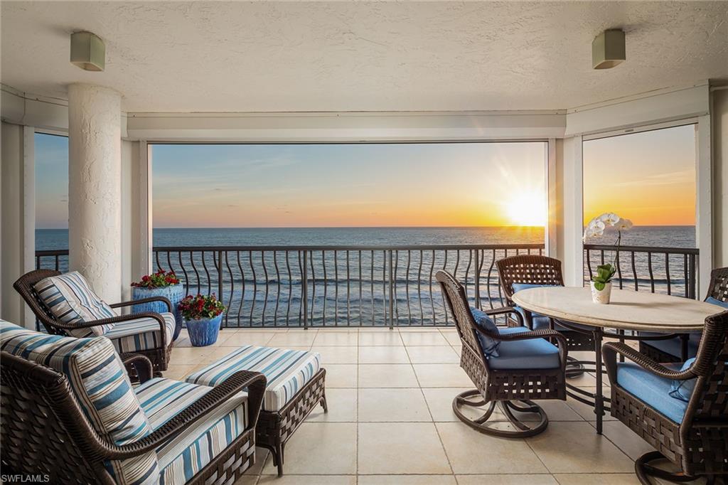 Live on Naples Miracle Mile. Spectacular direct beachfront views from this eighth-floor, pet-friendly apartment. Enjoy gorgeous sunsets and sweeping views of miles of white sandy beach from multiple terraces. The irresistible sounds of surf and sea beckon. This sophisticated three-bedroom and den, four-bath apartment has been updated by the owner to include a kitchen with white cabinets, quartzite countertops, stainless appliances and breathtaking views of the gulf. Updated dual owners' baths with white cabinetry and granite vanity tops, large living room with wet bar with Verde marble top and wine cooler. Two new air conditioners in 2022. Via Delfino is a small, boutique building with only 24 apartments, three per floor. Some of its outstanding features include an on-site manager, dogs of any size allowed, a beautiful lap pool with a poolside lounge area and a whole building generator. It is superbly close to Old Naples with its renowned restaurants and shopping.