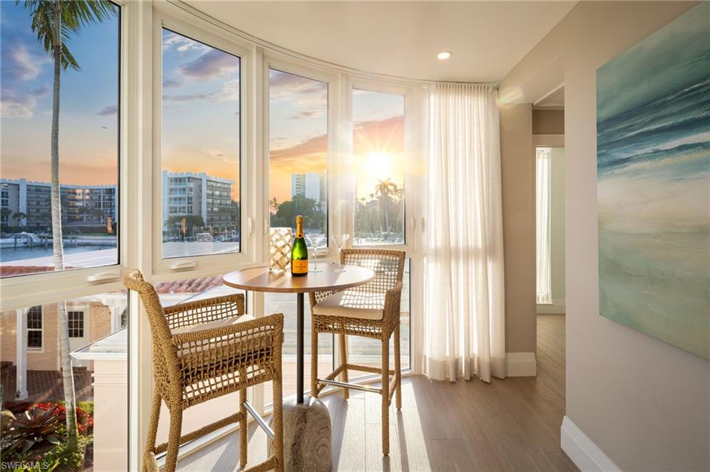 Sunrise over Venetian Bay. Sunset over the Gulf. Both are yours to enjoy
from this turnkey furnished coastal retreat in Venetian Isles at Park Shore.
Set on the second floor, this reimagined residence offers a total of 2,479 square
feet of single-level living and blends bespoke craftsmanship with relaxed
coastal elegance. A private elevator opens directly into light-filled interiors,
where refined finishes create an inviting atmosphere for both everyday
living and entertaining. The elevated position offers added peace of
mind, with approximately 95% of the main living areas unaffected during
Hurricane Ian.
The expansive great room flows seamlessly into the dining area,
complemented by wide-plank tile flooring that is both elegant and
pet-friendly. At the heart of the home, the gourmet kitchen features an
oversized stone-wrapped island, premium appliances, wine storage, and
exceptional design. Three spacious ensuite bedrooms and a powder room
provide comfort and privacy for residents and guests alike.
Additional features include a private garage, custom finishes, a tuckedaway
laundry area, and a spacious balcony with a motorized awning
overlooking wide water views. Unique curved windows frame breathtaking
sunsets toward the Gulf.
Residents enjoy private Park Shore Beach access just across the street, as
well as a bayside pool, secure entry, and proximity to Venetian Village’s
waterfront dining and boutiques, offering an effortless coastal lifestyle
in one of Naples’ most desirable waterfront communities.