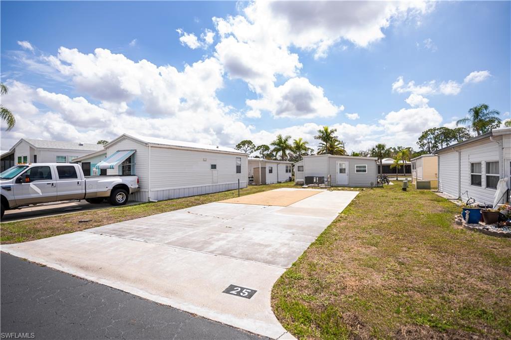 Located in Fountain View RV Resort, a well-established and professionally managed 55+ community where residents own the land, this deeded RV lot offers an excellent opportunity to build or park with confidence. Lot #25 measures approximately 33' x 59' x 35' x 59' and features a south-rear facing back-in concrete pad, ideally positioned just a short 5-unit walk to the clubhouse. The lot is fully improved with cable, water, sewer, and both 50-amp and 30-amp electric service, and can comfortably accommodate RVs up to approximately 38 feet, including Class A, Class C, Super C, fifth wheels, or the placement of a permanent manufactured home (subject to community and local guidelines).  Residents enjoy an active lifestyle with amenities including a clubhouse, community pool, spa/hot tub, bocce courts, shuffleboard, tennis, volleyball, basketball, and a variety of organized social activities. Optional RV and boat storage is also available within the community.  The low HOA fee of $264.50 per month includes lawn and land maintenance, on-site management, and access to the community recreational facilities. Conveniently located just minutes from downtown Fort Myers, with easy access to shopping, dining, medical facilities, golf courses, and Southwest Florida’s Gulf beaches.  An excellent opportunity to secure deeded land ownership in a vibrant Southwest Florida community and enjoy the Florida lifestyle.