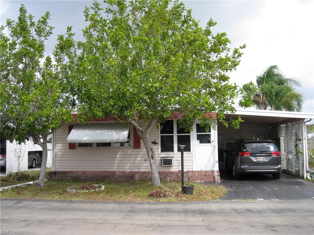 Large home located in desirable Tamiami.  Homes features over 1300 sq ft under air with ground Florida room and shed add another 325 sq ft.  Home has all new carpeting with 3/4" plywood sub flooring through out home, new commodes in bathrooms, new cook top, a/c unit is a 1 1/2 years old with all new duct work.  Raised Florida room measures 8'5" x 15', ground Florida room measures 12' x 18' and shed measures 8' x 8'.