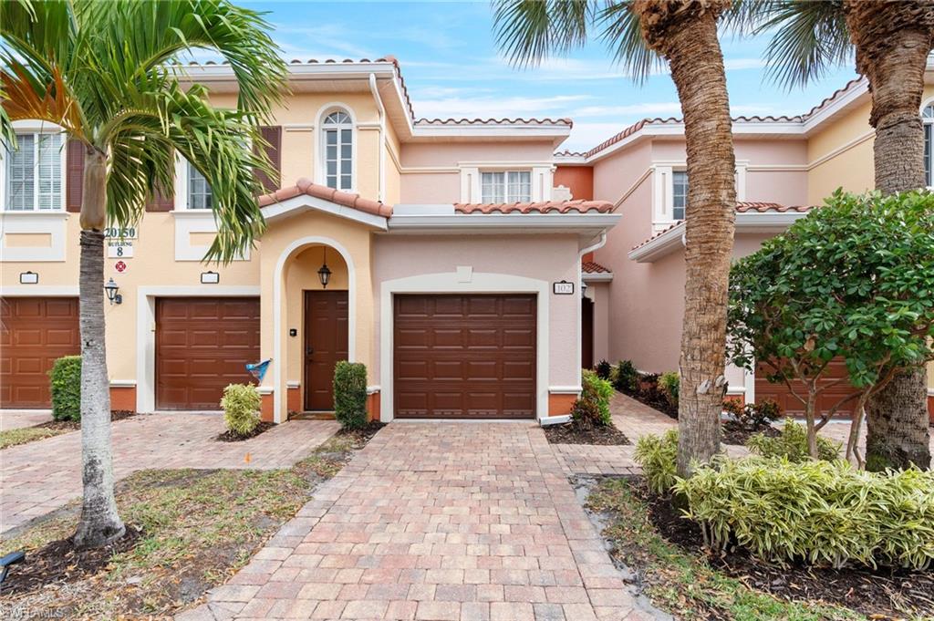 Welcome to Villagio, a gated community in the heart of Estero offering exceptional value. This two-bedroom, two-bath ground-floor residence with an attached garage is situated in one of the community's front enclaves, where abundant green space and generous guest parking directly in front of and adjacent to the building provide a sense of openness and convenience rarely found elsewhere in Villagio. From the oversized lanai, take in a deep, expansive lake view across the landscaped grounds — a setting that delivers a picturesque backdrop for everyday living. Just steps from the community's amenity center, residents can take full advantage of brand-new pickleball and tennis courts, multiple swimming pools, a community spa, a large fitness center, a private movie theater, and on-site property management. The on-site Café serves a full daily menu featuring local favorite Royal Scoop ice cream. This residence features hurricane impact glass windows and doors, granite countertops, high-quality cabinets rarely found at this price point, and tile throughout including the lanai, while the brand-new roof, fresh exterior paint, and road resurfacing have all been community-funded at no cost to the owner. Low taxes and a $580 monthly condo fee make Villagio one of the best values in Estero — the condo fee includes water, Xfinity X1 cable with DVR and voice remotes, high-speed wireless internet, building insurance, exterior pest control, and landscaping. This FHA-approved community is gated 24 hours a day.