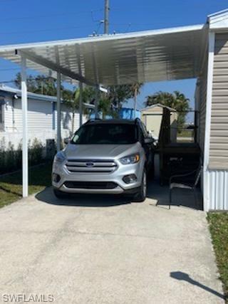 What an opportunity!  Own your land, $140 yearly maintenance fee!  2005 mobile home with carport.  This home has a living room, kitchen with newer appliances, washer and dryer.  Two bedrooms, 1 1/2 baths.  Carpet and vinyl flooring.  Metal roof, shutters and newer A/C.  Pets allowed.  Great location near the beaches, bus routes and shopping.  Hurry to make you appointment today.