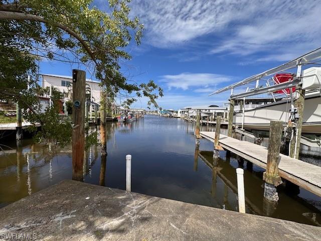This is the least expensive gulf access lot, without going through locks or under bridges, available on Pine Island!  This St. James City waterfront lot awaits a new mobile (single or double wide) or build a modular or stick built home!  No impact fees are due if a mobile is replaced on this lot, as the original home was demolished, saving the buyers thousands of dollars.  Water and electric are available.  Enjoy fishing some of the best waters in all of SW Florida!  Boca Grande, "Tarpon Fishing Capital of the World" is just a few minutes away!  Enjoy the beautiful sunsets that Pine Island has to offer, or jump on your boat and watch the sun set over the Gulf of Mexico.  All, just moments away!  Hurry before it's too late!