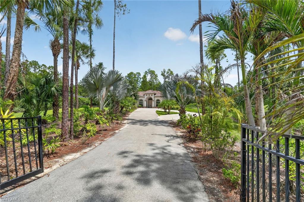 Built in 2018, this better-than-new home sits on 2.27 acres of 100% upland property, offering both space and privacy from the moment you pass through the front entry gate. With nearly 2,800 square feet of living space, the residence features 3 bedrooms plus a versatile den, and 2 full bathrooms all centered around a spacious open-concept layout with a large great room.

Designed for both everyday living and entertaining, the home offers casual and formal dining areas, along with an expansive recreation room ideal for gatherings. High-end finishes are found throughout, including 12-foot ceilings, 8-foot doors, marble windowsills, picture window in dining room, tile flooring in the main living areas, den, recreation room, and bathrooms, as well as warm wood flooring in the bedrooms.

Recent improvements add significant value and modern appeal, including fresh interior and exterior paint, new Whole House reverse osmosis system, AC system, water heater, dishwasher, stove and range hood, all faucets, lighting fixtures, kitchen countertops and farmhouse sink. Both bathrooms have also been recently upgraded with new fixtures, mirrors, lighting, and glass enclosures. Outdoor enhancements include a newly paved pool patio, new pool fence, and lightly cleared preserve area. Additional fencing and parking, provides flexible space for gardening, pets, play areas, Boat and RV storage and more.

This is a must-see property to truly appreciate everything this home and land have to offer.