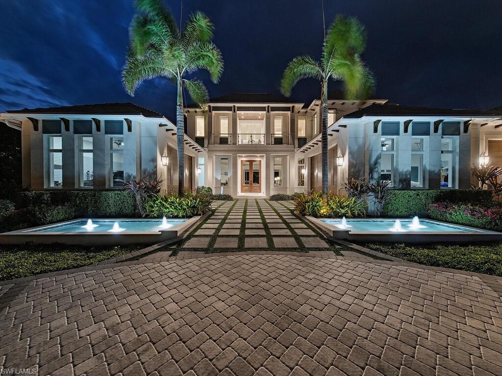 Immaculate, nearly new custom home, built in 2020, w/ 111’ of water frontage & western exposure in exclusive Port Royal, w/easy access to the Gulf of Mexico. Designed by Kukk Architecture & built by A. Vernon Allen Builders, this resort-worthy, 2-story home features well-crafted interior finishes, 5 full-bedrooms w/en-suite baths (includes 2nd flr VIP suite & laundry), a full pool bath & 2 half baths, elevator, dining room, club room & den/6th bedroom w/walk-in closet. Numerous upgrades can be found throughout including Control 4 Audio/Video system, Lutron shades in 9 rooms, steam shower in master, security system & whole house audio system. The chef-grade kitchen features high-end cabinetry, huge butler’s pantry & top-of-the-line appliances: 60” Wolf range, 72” Subzero Ref/freezer, Wolf steam oven, icemaker, 2 Subzero wine coolers. The stunning, outdoor pool complex includes a spa, outdoor kitchen & bar, & built-in fire pit/lounge. Other boaters will envy the properties Bellingham 48' concrete floating dock with 7×12 landing, 33,000lb super lift & 2nd 7,000lb beamless lift. Residence is finished with a five-car garage w/cabinets & slat-wall system. Port Royal Club eligibility.
