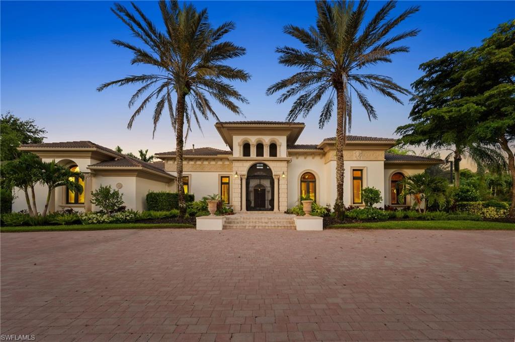 Luxury abounds at this exquisite estate home featuring 5 Bedrooms, 5 and 1/2 baths, formal and informal living spaces and includes a casita for guests and family. Supremely detailed from the coffered and tray ceilings, impact doors and windows to the custom flooring throughout. Enter the double front door to the grand foyer overlooking the living room anchored by a large fireplace with views beyond of luxurious outdoor spaces. Let your inner Chef delight in the well-designed kitchen complete with an island and additional prep sink to the abundant storage, gas range and exceptional granite countertop area. This space opens to the family area for informal gatherings with a slider to your outdoor kitchen and screened lanai where you will bask in serene and exquisitely private spaces with a heated, saltwater pool/spa, elevated seating area with fireplace for fabulous gatherings and entry to the private casita. 5 luxurious bedrooms, all en-suite, a den and another powder room all create an oasis for an unparalleled lifestyle. Incredibly located, central to "toes in the sand" beaches on the Gulf to downtown Naples for "Fun on Fifth", RSW airport and easy access to I-75.
