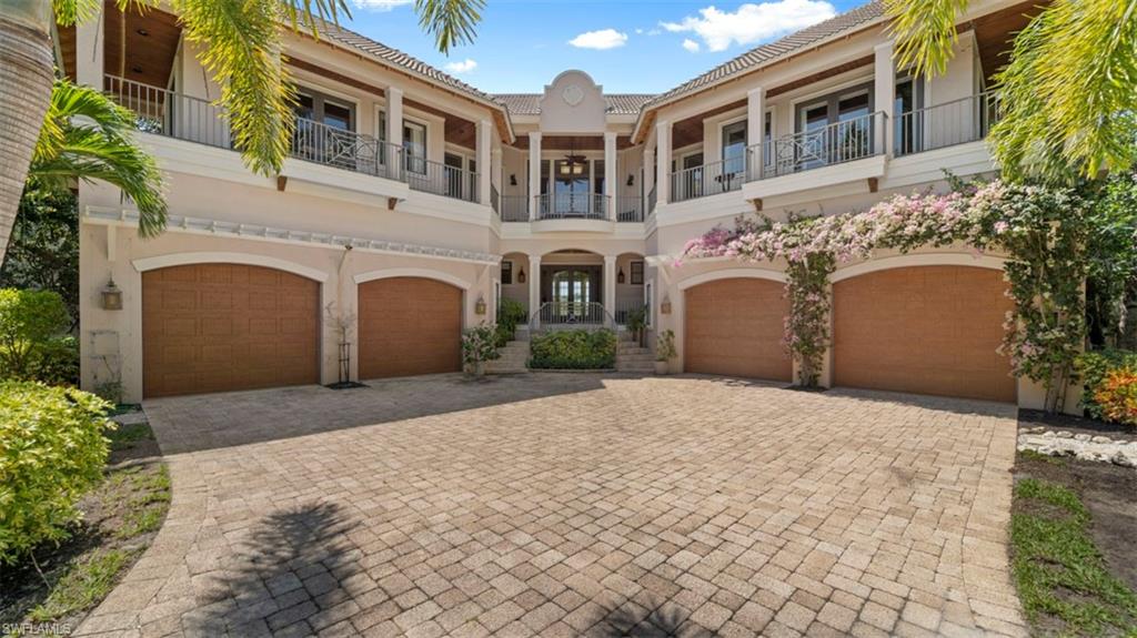 Welcome Home! Stunning Sanctuary Residence with breathtaking views of the third fairway. Boasting over 5800 sqft this home features 5 bedrooms, an office, 5.5 bathrooms and a 4 car garage. intentionally constructed with the main living areas and master on the top floor for the owner to ALWAYS be able to enjoy the most beautiful views of the property. First floor features 4 guest rooms all with their own ensuite baths, morning kitchen, wine storage and laundry as well as its own lanai overlooking the pool and spa. Up the stairs you will find yourself pleasantly surprised by the open yet warm feeling of the 2nd floor featuring balconies on both sides, one overlooking the golf course and the other the preserve. The timeless finishes of this home are truly second to none; travertine marble floors throughout, impact windows and doors, Clive Christian kitchen cabinetry, a teak island, and wood finished ceiling in the living area. Offered completely Furnished. One of the most beautiful homes in The Sanctuary, schedule you showing today.
