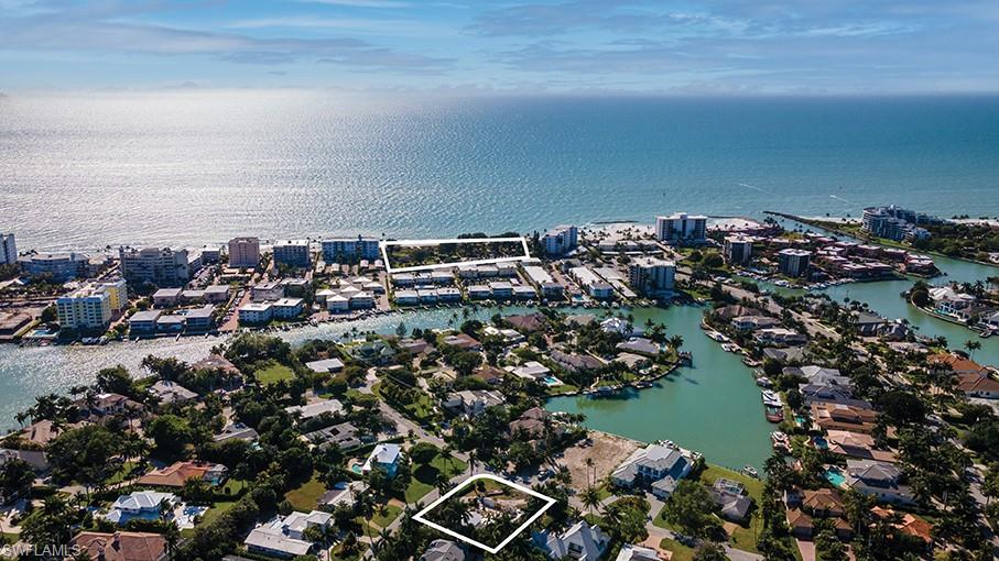 One of the finest locations in the Moorings. An oversized corner site with a southerly orientation west of Crayton Rd. This exquisite single level luxury home is being crafted by the collaboration of Naples Development, Gulfstream Homes, and award-winning Linda Sonders Design. 5 bedrooms and 5.5 baths with expansive indoor and outdoor living spaces that seamlessly flow out to a resort style pool and sun deck by low threshold 10’ sliding doors pocketing away. Some of the sensational finishes and features include Legno Bastone white oak floors throughout, and a suite of Subzero and Wolf appliances appointing the main kitchen and service kitchen with Ruffino Cabinetry showcasing the finest millwork offered in Naples. White marble mosaic tiles adorn the baths with designer selected quartzite counters. Whole home automation, security, cameras, and Sonos sound. Custom built in motorized window shades, custom closets, roll down screens and shutters, and a whole home generator will leave nothing to be desired. Masterful ceiling designs as well as a full designer look book are available for buyer review.