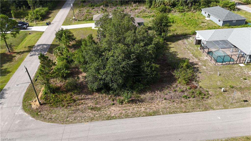 A great opportunity to own a spacious corner residential lot in the quiet, scenic community of Alva. This property offers added flexibility for home design, driveway placement, and curb appeal—perfect for a new build, a future investment, or anyone looking for extra breathing room.

 Property Highlights
Premium Corner Lot  
Wider frontage, easier access, and more design options for your future home, garage, or driveway layout.

Quiet, Rural Setting  
Enjoy the peaceful lifestyle Alva is known for—open skies, quiet streets, and a relaxed country feel.

No HOA or Restrictions  
Build freely without monthly fees or strict rules.

Plenty of Space  
Ideal for a large yard, garden, workshop, or outdoor living features.

Growing Area  
Surrounded by new homes and steady development, supporting long-term value.
 Location Benefits
Minutes to SR-80 for quick access to Fort Myers, I-75, and RSW Airport

Close to parks, boat ramps, and the Caloosahatchee River

Near schools, local shops, and dining

Easy commute to Labelle, Buckingham, and East Fort Myers

 Why This Corner Lot Stands Out
Corner lots offer better home orientation, more privacy, and enhanced curb appeal—giving you more flexibility and long-term value. Whether you’re building now or holding for the future, 2025 Robert Ave is a smart, versatile choice in a peaceful Alva location.

Click below for ariel view!
www.propertypanorama.com/instaview/fgcmls/2026022751