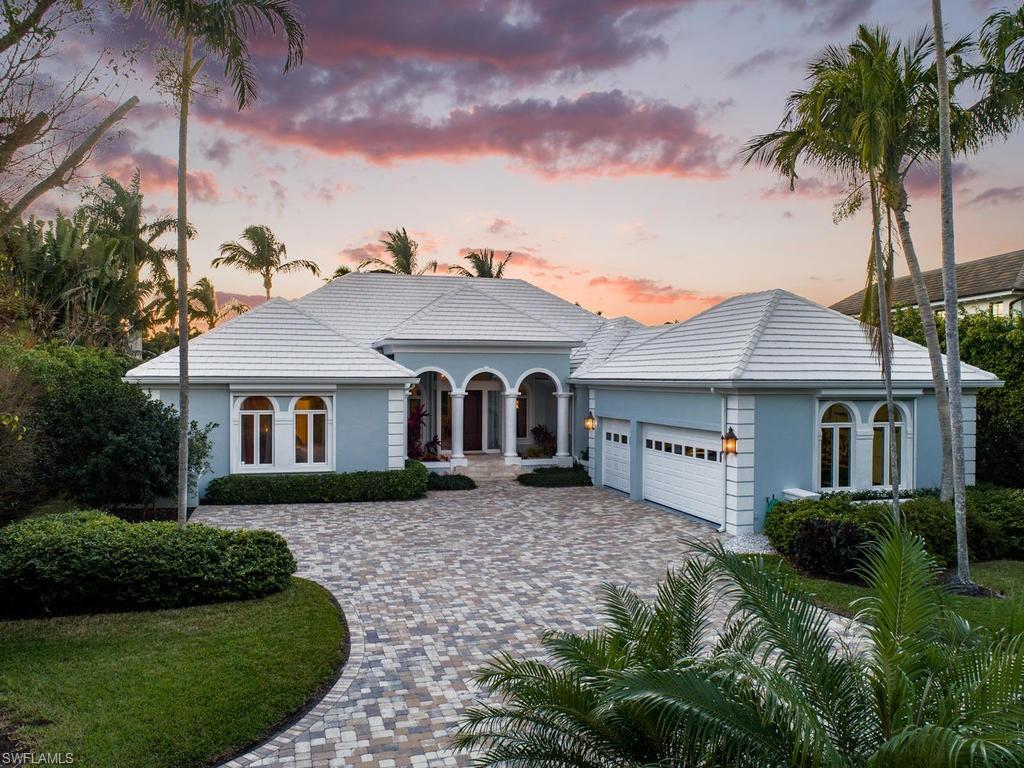 RECENT PRICE ADJUSTMENT. Fabulous Bermuda-inspired residence with wonderful westerly views and breathtaking sunsets overlooking Morgan’s Cove. 4 bedrooms plus den, 4 full baths and 2 half baths. Newly renovated gourmet kitchen with granite counters, custom cabinetry, Wolf 6-burner gas range, Wolf double oven, stainless steel Bosch dishwasher, quadruplet wine cooler, and wet bar.The charming family room also affords incredible views with a fireplace with marble surround facing The gracious master suite offers his and hers master baths, large walk-in closets, and lovely views. . The intimate formal living and dining room features French doors that open out onto the pool lanai and saltwater pool and spa area. New dock with fish cleaning table, a concrete 60 ft. floating dock with 2 lifts-a 13,000 lb boat lift and 10,000 lb. boat lift makes this a boaters delight. 116 ft. of water frontage. Screened lanai with automatic screens, automatic hurricane shutters, air-conditioned 3-car garage. Port Royal Membership Eligibility.