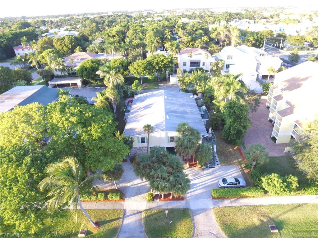 Unique opportunity for “buy & hold” or immediate redevelopment investment in the heart of the Olde Naples district, bordering Aqualane Shores. Large 100'x151’ lot with existing rental income producing condominium association in an unrivaled location between 5th Ave. and 3rd St. and within walking distance to everything downtown Naples has to offer! A large parcel with 15,100 sq ft that can be redeveloped into 1 or 2 large single family homes, 3 townhomes or 4 condos! This parcel is zoned R3T-12, which allows unique transient rental opportunities for downtown Naples. It can be sold in bulk (100'x151’); or, be re-plat into two separate parcels (50’x151’ each) AT ONLY ($260 SF) OR sold separately. Current owners have worked with the City of Naples, various architects and contractors in town on all building possibilities. Sample plans, as well as estimated building costs from local top contractors in hand and can be shown to potential serious buyers. PRESENTLY ALL RENTALS UNITS ARE GENERATING ALMOST $72K GROSS YEARLY. REAL AVERAGE VALUE ON MARKET:$2,880,300.