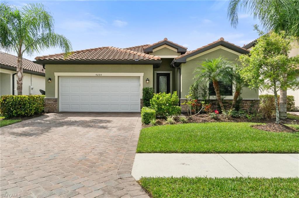 This stunning home in the highly desired neighborhood of Raffia Preserve checks ALL the boxes!  Your PRIVATE SWIMMING POOL with Screened Lanai is surrounded by a lush array of Palm trees and beautiful landscaping, creating a tropical oasis.  This light, bright, and airy home features all the modern finishes including Granite Countertops, Stainless Steel Appliances, White Cabinets and so much more.  With over 2,006 square feet, this Open Concept floor plan includes FOUR Large Bedrooms and THREE Full Bathrooms, so you'll have plenty of room for guests and entertaining.  With tile floors throughout the house and crown molding to top it off, this home is move in ready!  4224 Raffia Palm Cir is just 5 doors away from the Raffia Palm Clubhouse which has all the amenities you could dream of including a Resort Style Pool, Lap Lanes, Fitness Center, Social Room, Playground, Basketball Court and more! Raffia Palm is conveniently located near the intersection of Vanderbilt Beach Rd and Collier Blvd. with entrance from both roads. Your front door is 8.6 miles to the white sands and breathtaking sunsets at VANDERBILT BEACH on the Gulf of Mexico.  This home will sell fast!