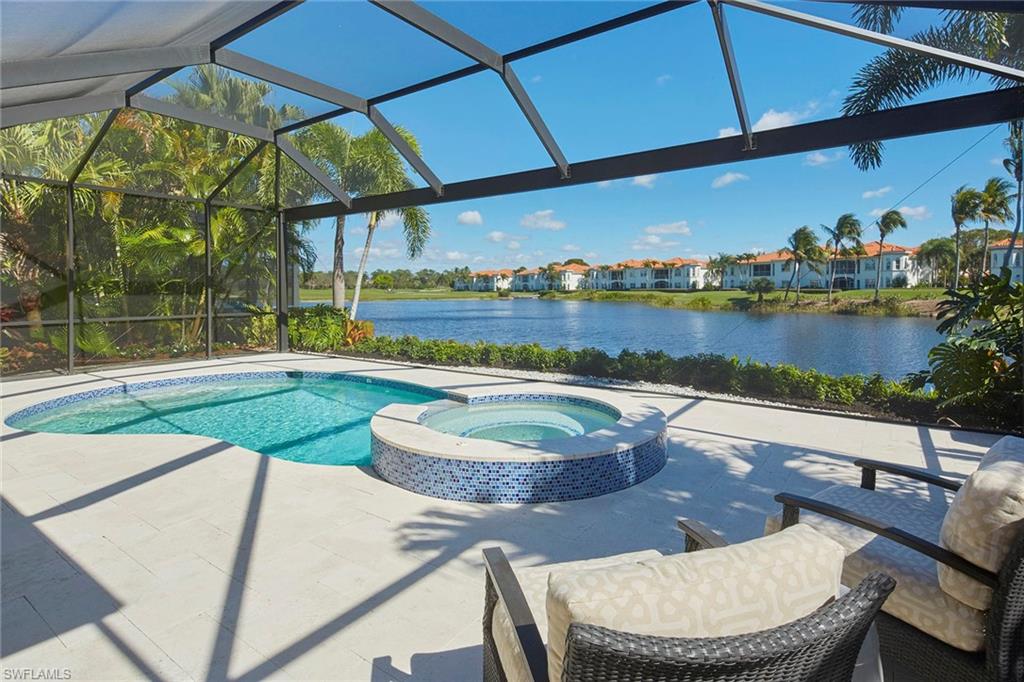 Welcome to this remodeled lake-to-golf view home in the heart of the exclusive country club community of Grey Oaks. This 4-bedroom plus study, 3.5-bath home has been tastefully renovated to be an open great room plan perfect for entertaining friends and family. The gourmet kitchen features a spacious island with white quartz countertops and includes Wolf and Sub-Zero appliances with additional beverage drawers, wine cooler and ice maker. The open concept includes luxurious wide plank white oak flooring throughout, a 16-foot slider opening, and a large picture window overlooking the reimagined outdoor living space with a nearly 40-foot covered lanai with pool and spa beyond. The pool and deck have been completely updated and the new screen enclosure features a full-width picture window expanse to take in the long-range lake and golf views while relaxing outdoors. Additional features of this magnificent property include a new roof in 2022 and AC in 2023, tankless water heater, custom closets and a completely updated primary bath and guest baths. A world of luxury awaits you in the upscale Grey Oaks Country Club located minutes from Old Naples with 54 holes of golf and world-class amenities.