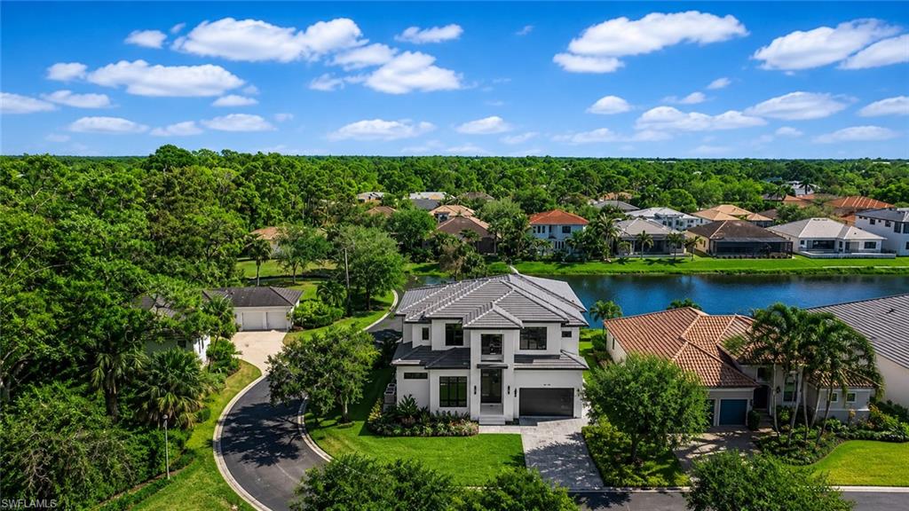 Welcome to an extraordinary, newly custom-built masterpiece nestled in the heart of beautiful Bonita Springs. This ultra-luxury residence showcases impeccable design, expansive living spaces, and sophisticated designer finishes throughout—offering the ultimate in modern coastal elegance.
Featuring 5 bedrooms, 5 full bathrooms, and 2 half baths (powder bath and pool bath), this stunning home is thoughtfully designed with a spacious open-concept floor plan ideal for both everyday living and grand entertaining. Dual laundry rooms—conveniently located on both the main level and upstairs—add to the home's exceptional functionality.
Step outside into your private resort-style oasis. The screened lanai offers a seamless indoor-outdoor lifestyle complete with a fully equipped outdoor kitchen, expansive entertaining areas, and an upstairs balcony overlooking serene surroundings. Relax in the heated pool and spa, all set against tranquil lake views enhanced by a custom Zen-inspired fountain.
Built with quality and peace of mind, this home includes impact-resistant windows and doors throughout.
Located within the exclusive, boutique Serrano community, residents enjoy a rare lifestyle with direct Gulf access via the Imperial River—perfect for kayaking, paddleboarding, and fishing enthusiasts.
Ideally situated just 15 minutes from Southwest Florida’s world-renowned beaches, upscale dining, and luxury shopping, and only 20 minutes to Southwest Florida International Airport (RSW), this property offers both convenience and exclusivity.
This is a rare opportunity to own a one-of-a-kind luxury residence in one of Southwest Florida’s most desirable waterfront communities.