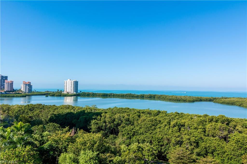 E-Z-2-C!!  This ninth floor Pelican Bay condo offers stunning panoramic views of the Gulf of Mexico. Upon entering you are immediately captivated by the views of turquoise Gulf waters and the coastal casual decor.  Beautifully upgraded kitchen, ceramic tile floors and neutral decor distinguish this residence and will make it one you’ll want to call home.   Stroll the 3 miles of pristine Pelican Bay beach, the boardwalk through Clam Pass, spend an afternoon poolside or play tennis at the Foundation Courts, later watch spectacular sunset views from the balcony and prepare for an evening with your friends and family at nearby restaurants and entertainment venues. The St Nicole offers amenities including tennis courts,  fitness center, raised pool deck with spa, spacious social room, movie room, billiard room and two guest suites - all included in the low fees.  Minutes from shopping, dining and entertainment at Waterside Shops, Mercato and Olde Naples, and area golf courses and local marinas. You’ll want to see this one first!  Ready for immediate occupancy.  Call now for more details and to schedule a private showing!