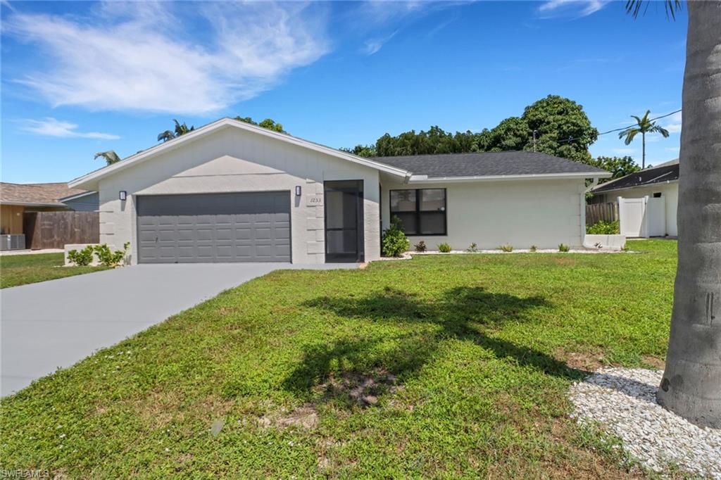 Step into this beautifully remodeled 3-bedroom, 2-bathroom home and experience the perfect blend of modern elegance and relaxed Florida living. With a brand-new roof and stylish updates throughout, this home is move-in ready and waiting for you! The spacious open floor plan fills with natural light, creating a warm and inviting atmosphere. The kitchen flows seamlessly into the family room and dining areas, making it ideal for entertaining.

Enjoy the tranquility of your private backyard, perfect for morning coffee, weekend barbecues, or simply unwinding after a day at the beach. The 2-car garage provides ample storage, while the prime central location places you just minutes from Mercato, 5th Ave, and Naples' world-renowned beaches. Best of all, NO HOA fees!

This is your chance to own a slice of paradise.