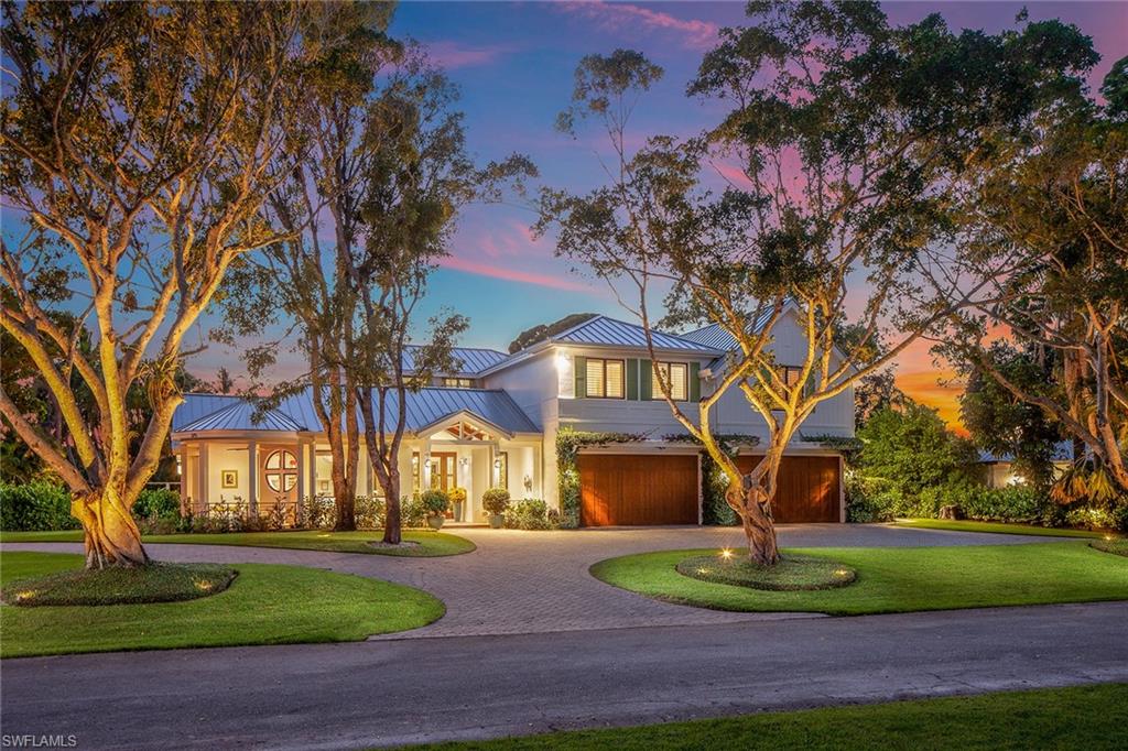 Tucked away on a half-acre site, on one of Coquina Sands most private streets, sits this custom residence thoughtfully designed by Jon Kukk and masterfully built by Harwick Homes. Exceptional floor plan with the utmost attention to detail, including exposed box-beam and rafter ceilings, reclaimed antique-wood flooring and an incredible Andersen window/door package. Epicurean kitchen that includes crisp white custom cabinets, gray double island with Pompei Quartz countertops and Wolf/Sub-Zero appliance package. French doors lead to a secluded family room, which features a Lutron system and electric shades; ideal for game day or a late night movie. Unrivaled master suite with impressive custom closets, dual showers, water closets and Kohler Sunstruck stand-alone tub. A private door off the master leads out to the dog run; perfect for Fido’s last outing before bed. Upstairs features include a guest suite, exercise/5th bedroom, bonus and storage room. Expansive outdoor area with 50’ pool, low-maintenance Zuri Decking, motorized screens, EVO Affinity grill and outdoor shower. Four-car garage that can accommodate the most acclaimed collector completes the property.