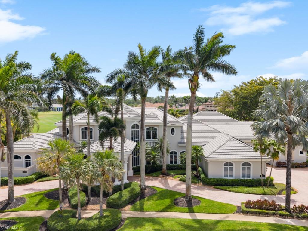 Welcome to the opportunity of a lifetime—your dream home is now waiting for you, but it won’t last long! Step inside and be immediately captivated by the grand entrance, where dual staircases greet you, exuding luxury and innovation. The soaring 22-foot windows flood the space with natural light, highlighting the expansive, tastefully designed living areas that are as beautiful as they are funtional. As you explore this remarkable home, you're embraced by stunning views of the pool, spa, and outdoor living space—perfect for relaxation or entertaining. Recently updated to provide long-term financial benefits, this home is equipped with cutting-edge solar panels and a Tesla Powerwall for sustainable, backup energy. The home has been thoughtfully enhanced with fresh paint, electrical upgrades, and smart home technology to keep you connected and comfortable. Set on nearly an acre of land with breathtaking views of Quail West Golf and Country Club’s 15th hole of the Preserve course, this sprawling 13,000+ square foot estate offers an unrivaled living experience at an exceptional price. The main house features four generously-sized en-suite bedrooms, and the guest cabana offers its own private suite with serene views for ultimate peace and privacy. The heart of the home, the kitchen, is an entertainer's dream, complete with built-in cabinetry and a massive island, all just steps away from the great room. Whether you’re hosting a gathering or enjoying a quiet family evening, this space is designed for both elegance and function. Don’t miss out on this rare opportunity—time is running out. Your new home is just a call away. Come see it for yourself and make this dream a reality today!