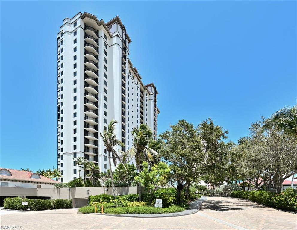 Enjoy breathtaking views from the 20th floor of this luxurious 2-bedroom, 2-bathroom condo. Decorated in a neutral coastal style, the living room is the perfect place to relax. The bright white kitchen features tray ceilings, a wall oven, and an electric cooktop, making cooking a pleasure. The dining room boasts custom mirrors, a beautiful table with seating for six, and a stunning chandelier. Your primary suite includes a king-sized bed, a work area with a large window overlooking the crystal blue Gulf, and direct access to the lanai. The primary bathroom offers dual sinks, large mirrors, walk-in shower and separate soaking tub. Your guests will enjoy the comfort of twin beds, a large window, and an ensuite bathroom with a shower/tub combo. Convenient assigned parking is available under the building. The Coronado is an amenity-rich tower featuring 24/7 security, a fitness center, a community pool and spa, guest suites, social room, and a tram to the beach with private restaurants. Other Pelican Bay amenities include beachfront dining, Fitness Center, Har Tru Tennis Courts, community center and miles of scenic paved paths. Shopping and dining at the Waterside Shops and Mercato, as well as entertainment at the Artis-Naples Philharmonic Center, are all at your fingertips. Live exceptionally in Pelican Bay- extravagant living awaits you!