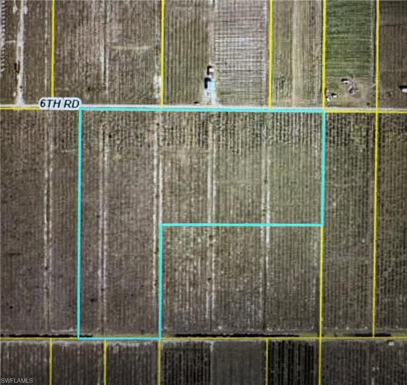 41 acres prime agricultural land cleared and ready to farm. There is a power pole that runs up to the property line for easy access to connect power, GPS will not take you to its location. This parcel is part of the established Gerber Groves Water Control District, providing essential irrigation and drainage infrastructure already in place, a major advantage for agricultural operations. Zoned for agricultural use, the property offers endless possibilities - from citrus, vegetables, and specialty crops to livestock, ranching or a secluded homestead. The surrounding area is a well-known farming community with nearby packing houses, agricultural operations and rural residences.