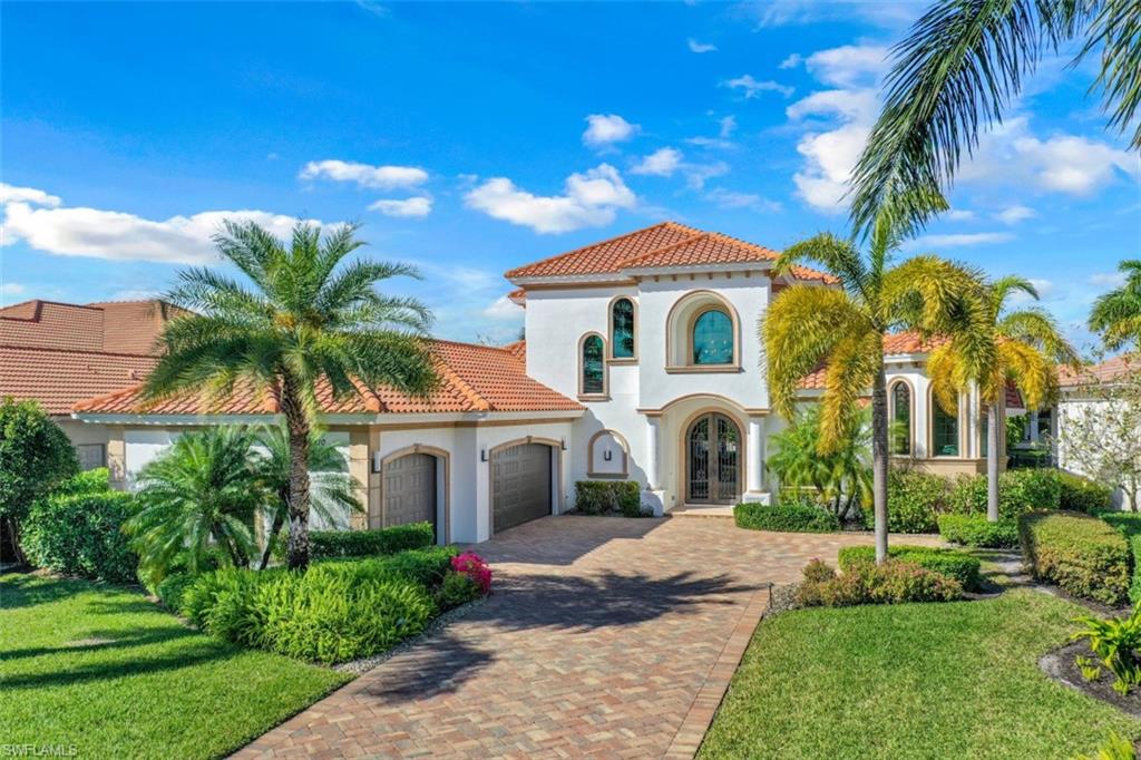 Grand Estate Waterfront Stunning home with by far the best view water view currently on the market.  The great room open floor plan  encompasses extra large living areas with with fabulous water views.  Light and airy garment kitchen with island pantry and breakfast bar.  This homes featuring 3 bedroom en-suite, large media room or 4th bedroom + a den/office, 3 car oversized garage, Private Dock, central vac, outdoor Kitchen with fireplace,  exterior misting pest system and so much more. 
  Miromar Lakes is masterfully designed around 700 acres of fresh water for boating featuring a stunning Clubhouse, the Blue Water Beach Grill, a 10,000 sq. ft. infinity pool and spa, fitness center, tennis courts, European Spa & Salon, movie theatre, billiard table, card room, informal, formal and private dining, fishing, skiing and swimming, miles of beautiful white sandy beach with cabanas. Golf Membership is available and located close to RSW Airport and extensive shopping and entertainment options.  It is understandable why Miromar was voted #1 Community in the US.