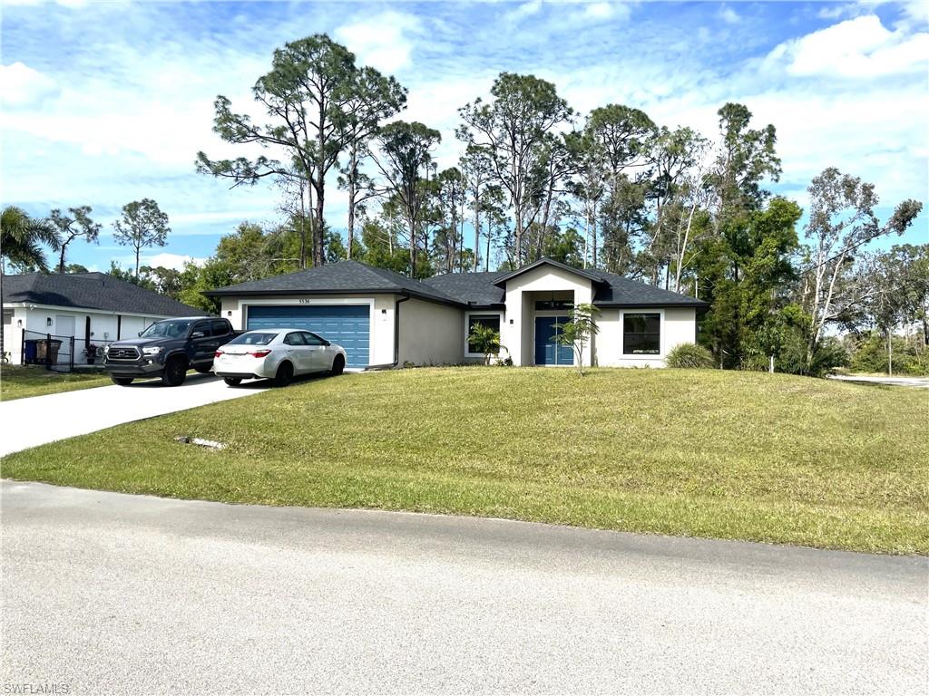 Beautiful House, 3 Bedrooms, 2 full Bath, corner lot, Tile floor throughout the house, granite countertops, white wood cabinet. recently epoxy garage floor painted. The house also has fruit plants, like lemons and Mangos.