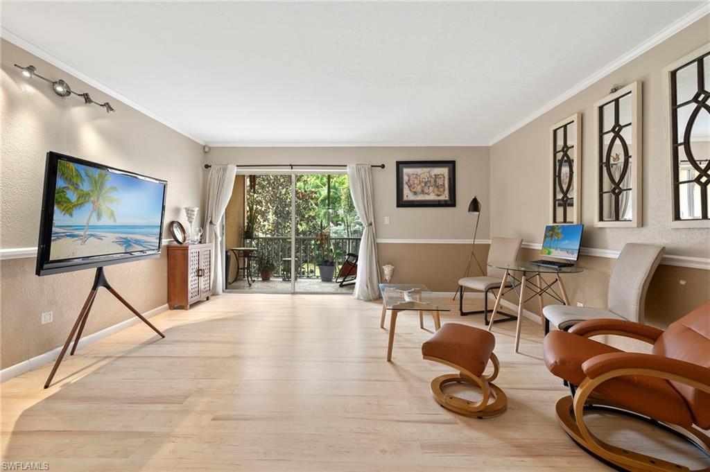 Enjoy peaceful courtyard and pool views from this beautifully updated second-floor condominium, where major improvements have already been completed, including a passed milestone inspection. The renovated kitchen features shaker-style cabinetry, granite countertops, subway tile backsplash, upgraded plumbing, and stainless steel appliances. Recent updates include a new water heater (2025) and air conditioning system (2023), providing added comfort and peace of mind. Inside, you'll find tile flooring in the kitchen and bath, durable laminate flooring throughout the main living areas, and a spacious bedroom with a walk-in closet. Relax on the screened balcony overlooking swaying palm trees, lush landscaping, and the community pool. Residents enjoy a clubhouse, grilling area, and beautifully maintained grounds, all just minutes from shopping, dining, and everyday conveniences. Whether you're looking for a seasonal retreat, full-time residence, or investment opportunity, this updated condo is ready to enjoy from day one.