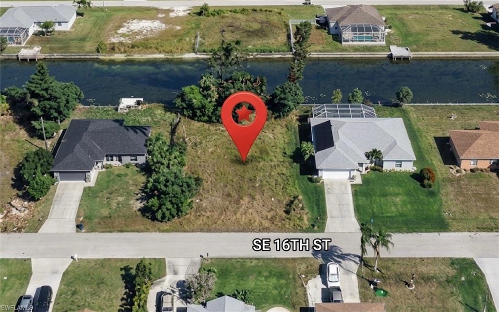 Build your dream home on this beautiful freshwater canal homesite in the heart of Southeast Cape Coral. Ideally located just off Santa Barbara Boulevard near Veterans Parkway, this property offers an exceptional combination of waterfront living and everyday convenience.

City water, sewer, and irrigation lines are already in. Enjoy peaceful canal views and access to freshwater recreation, including kayaking, paddleboarding, fishing, and wildlife watching right from your own backyard.

Conveniently located just minutes from Publix, Target, Lowe’s, restaurants, medical facilities, and countless shopping and dining options, you’ll have everything you need within easy reach while still enjoying the tranquility of waterfront living.