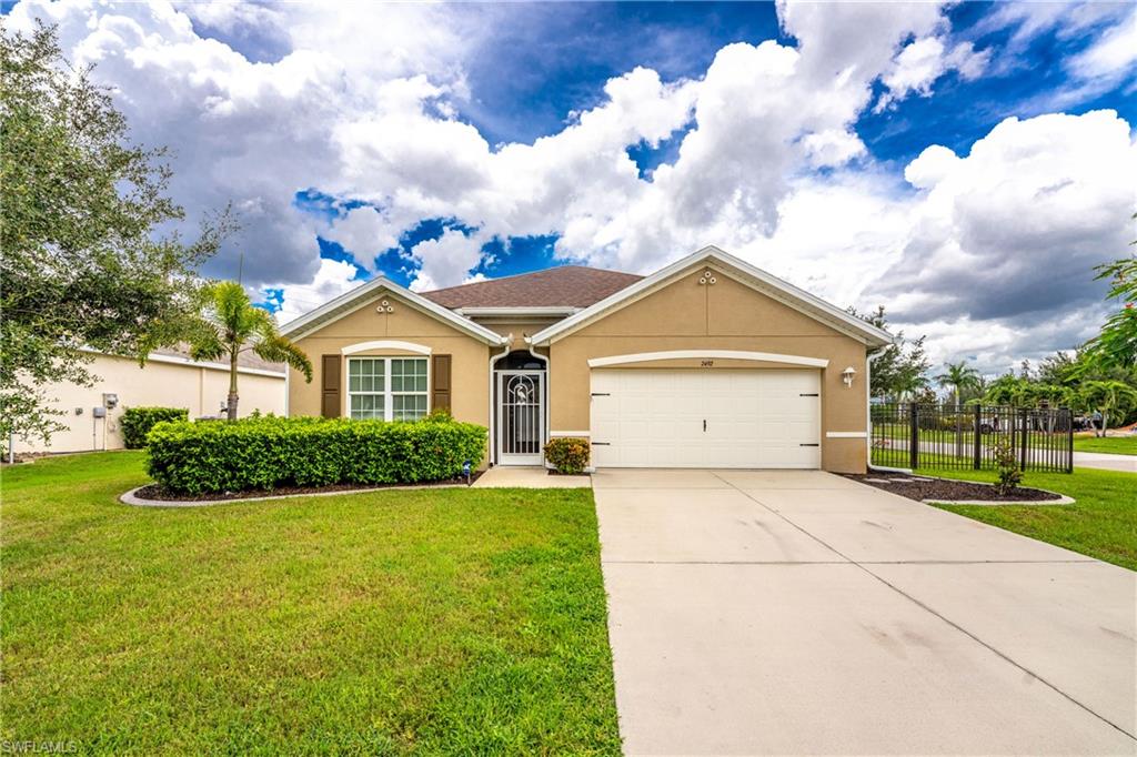 Welcome to your new home in the highly desirable & sought-after community of Waterford Estates—where modern design, comfort, quality construction, and the Southwest Florida lifestyle come together in one exceptional home. Built on the popular Cali floor plan, this beautifully designed residence offers 1,828 square feet of air-conditioned living space, featuring 4 spacious bedrooms, 2 full bathrooms, and a 2-car garage.

Step inside to an open-concept layout that's perfect for both everyday living and entertaining. The heart of the home is the well-appointed kitchen, complete with rich maple-stained cabinetry, stainless steel appliances, a large pantry, and an oversized island with breakfast bar overlooking the dining and great room. Whether you're hosting family gatherings or enjoying a quiet evening at home, this inviting space is designed to bring everyone together.

The private owner's suite is tucked away for added comfort and features a spacious walk-in closet along with an ensuite bath offering dual vanities and plenty of storage. Three additional bedrooms provide flexibility for family, guests, or a home office.

Enjoy Florida living year-round from the covered lanai overlooking a deep backyard with plenty of room to relax, play, or create your own outdoor oasis. Ideally situated just a short walk from the Waterford Estates Amenity Center, you'll have convenient access to resort-style amenities including a community pool, clubhouse, fitness center, pickleball and tennis courts, bocce ball, playground, and scenic walking paths. House equipped with Solar Panels and a fenced in yard.

Located just minutes from historic downtown Punta Gorda, residents enjoy easy access to waterfront parks, Fishermen's Village, shopping, dining, golf courses, boating, fishing, entertainment, and the Punta Gorda Airport. With its ideal location, thoughtful floor plan, and outstanding community amenities, this home offers the perfect combination of comfort, convenience, and lifestyle.

Don't miss your opportunity to own this incredible home in one of Punta Gorda's most sought-after gated communities—schedule your private showing today!