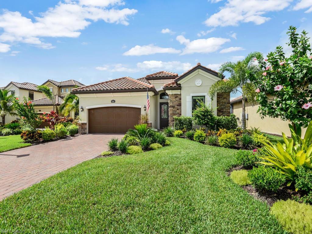 One of the BEST lakefront lots in all of Twin Eagles! Situated on a cul-de-sac and having a fabulous lake & golf course view, this single family pool home offers a great layout for seasonal or annual SWFL living. Offering over 2,200 sq ft of under air living space, this home features a great room layout w/ a master & guest suite, home office w/ pocket French door entry & wood flooring, elegant glass door front entry, gourmet kitchen design, impact resistant glass throughout, and split bedroom floor plan. Just built in 2019 and FULL OF UPGRADES including new landscaping, custom trim/molding, mirror in dining area, lanai lighting, motorized shade in master suite, electric storm screen on lanai, frameless glass in all bathrooms, plantation shutters, custom stone wall in great room, and entire home water purification system w/ UV light. You will love the amazing outdoor living space w/ an extended screened lanai offering Southern exposure, heated saltwater pool & spa, under truss sitting area, and summer kitchen. Twin Eagles "where the pros play" is situated on 1,115 acres of unspoiled, natural tranquility offering 2 Championship Golf Courses & much more. Full Golf Membership Included!