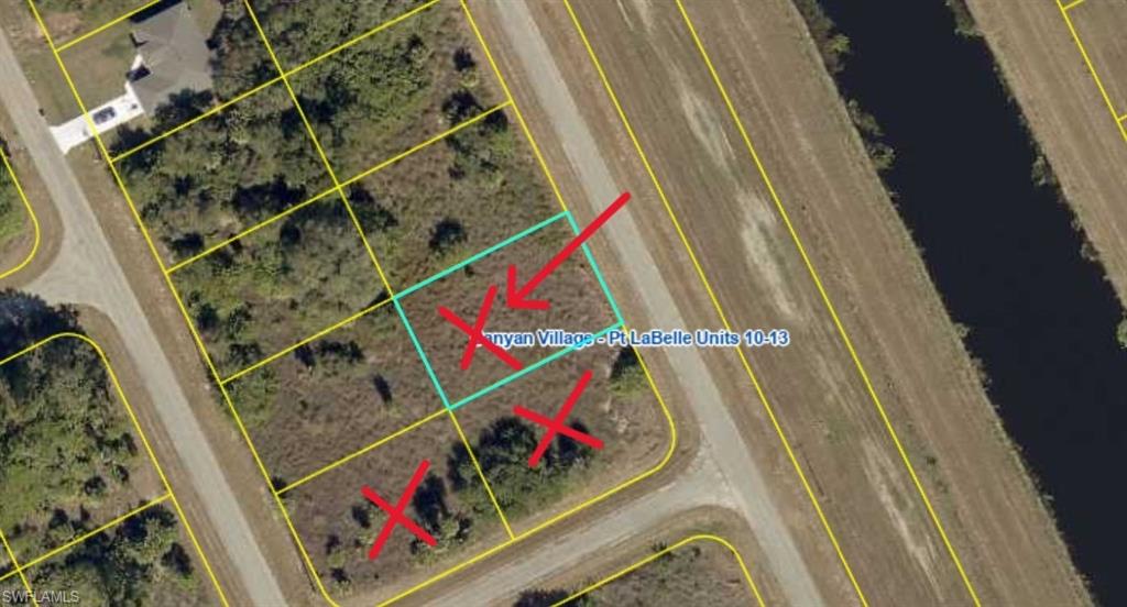 Rare opportunity to own one, two, or all three adjacent parcels! Two of the three lots are desirable corner lots, offering exceptional flexibility to build your dream home, create a larger homesite, or expand your investment portfolio. This 0.23-acre lot at 1116 Silverfish Dr enjoys a peaceful setting with no neighbors directly across the canal, providing added privacy and scenic views.

Located in the rapidly growing Banyan Village community in Port LaBelle, this property offers convenient access to major roadways while embracing the quiet lifestyle of Southwest Florida. Whether you're ready to build now or invest for the future, this is an outstanding opportunity. Don't miss your chance to secure one or multiple adjoining lots in one of LaBelle's fastest-growing communities!
Adjacent lots available:
1119 Andover Dr.
1118 Silverfish Dr.
1116 Silverfish Dr.