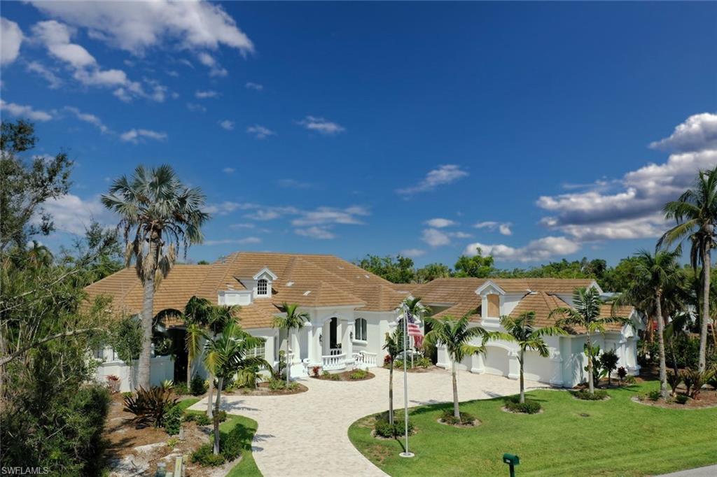 A stunning remodel with a spacious floor plan that flows beautifully around a resort style pool with wonderful privacy. Finely appointed throughout and resting on an oversized parcel this home is an island beauty located on coveted Troon Court. Soaring ceilings, cascading waterfalls and lush landscaping are just a few of this homes exceptional attributes.