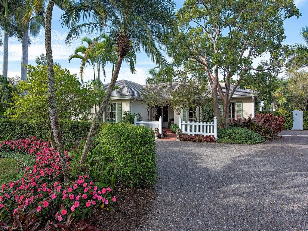 This sunny, serene residence is a boater’s dream with 100 ft of water frontage on an 80 ft canal, with direct access to the Gulf of Mexico. Ideally located on a beautiful, tree-canopied street, it is only 5 blocks to the sugar sand beaches of the Gulf, and a mere 6 blocks to the shopping and dining district of 3rd St S. Vaulted ceilings with skylights, extensive millwork and preserved oak wood floors allow natural light to bathe the home’s interior. In the evening, the canal provides Naples’ famed stunning sunset views. It offers a fully renovated kitchen, along with upgrades and renovations to bathrooms, bedrooms, and closets. A new custom office, laundry and pantry area, large pool and pool enclosure, upgraded lighting and electrical, and complete replacement of plumbing provide peace of mind. Outside, the home has complete hurricane protection, a new concrete tile roof, new stucco exterior, professionally designed and maintained landscaping and lighting with mature foliage. A new pergola, veranda and amazing outdoor shower offer enhanced outdoor living. This is a wonderful home for both entertaining and easy, day to day living for those who enjoy a walkable community.