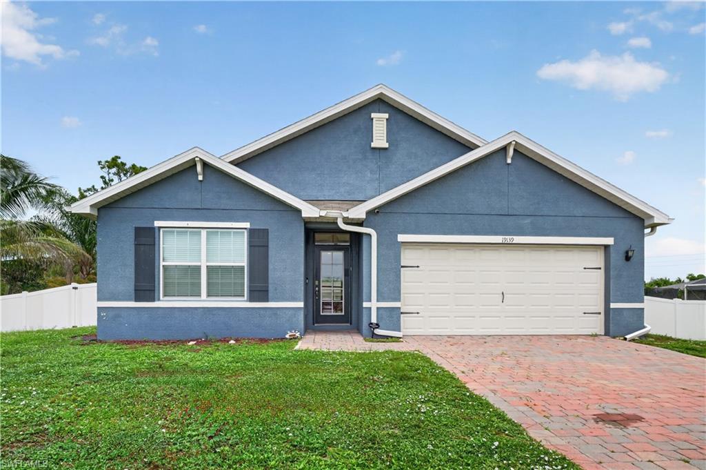 Beautifully maintained 4-bedroom, 2-bath home built in 2020, featuring thoughtful upgrades and a prime location in San Carlos Park. The open-concept floor plan is enhanced with custom shiplap accents, an upgraded kitchen with a large single-bowl sink, custom pantry shelving, and ceiling fans throughout. Energy-efficient R-38 insulation, an insulated garage ceiling, and added sound insulation between the primary suite and living area provide year-round comfort. Enjoy peace of mind with a security camera system and carbon monoxide monitoring. Relax or entertain on the screened lanai overlooking the fully fenced backyard with a 6-foot vinyl privacy fence. Situated on one of the highest elevations in San Carlos Park, flood insurance is not required. With no HOA fees or restrictions and convenient access to I-75, US-41, shopping, dining, beaches, and RSW Airport, this home offers the perfect combination of comfort, convenience, and value.