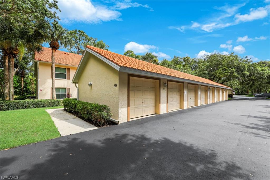 Nestled in the charming city of Naples, this beautiful first-floor end unit in the vibrant Sherwood community offers both convenience and tranquility. An airy oasis brimming with upgrades, the residence boasts plantation shutters, gleaming hardwood floors, and plush new carpeting, creating an inviting ambiance that welcomes you home. Recently painted, every corner exudes freshness and modern elegance. Enjoy serene moments on the screened lanai, gazing out over a peaceful pond and meticulously maintained landscaping, offering a picturesque backdrop for your daily life. New hurricane impact windows and doors ensure your peace of mind, while the residence stands proudly on high ground with the added benefit of low HOA fees. An active lifestyle awaits with access to brand new pickleball courts, tennis courts, and a lively clubhouse and pool. Perfectly positioned close to the sparkling beaches, vibrant downtown Naples, and an array of shopping and dining experiences, as well as a nearby hospital, this home offers the idyllic blend of luxury and convenience.