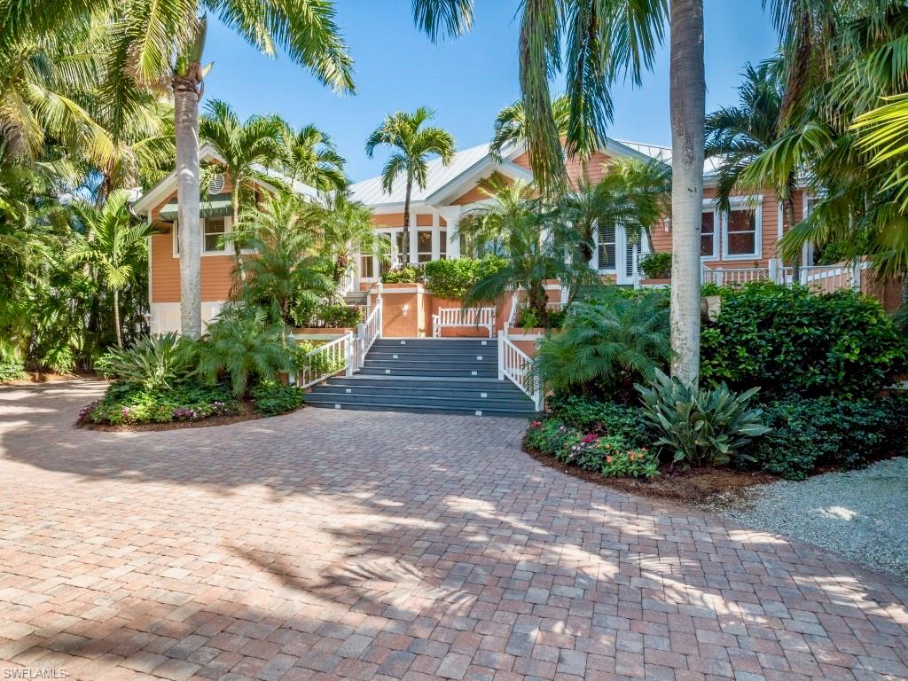 Welcome to the Bougainvillea House, one of Captiva Islands Premier Bayfront Estates! 2 acres of lush manicured gardens that features a magnificent main residence w/timeless casual feel that will accommodate large families & guest along w/a separate fully equipped 2 bedroom/2 bath guest house. The property features an incredible boat dock w/multiple lifts/covered boat house/deep water slip to park your yacht/live bait well/storage & fish cleaning table. Relax and enjoy one of the largest pool entertainment areas w/cabana that you will experience on the islands thats just steps away to your own private deeded beach access path. The main house boasts extraordinary
details including: fantastic spacious guest areas, tray ceilings, custom moldings, marble & hardwood floors, office, exercise room, elevator, 5 car garage,formal living & dining rooms, & a outstanding outdoor screened living space w/awesome water & nature views. The perfect compound for large families or a company retreat!