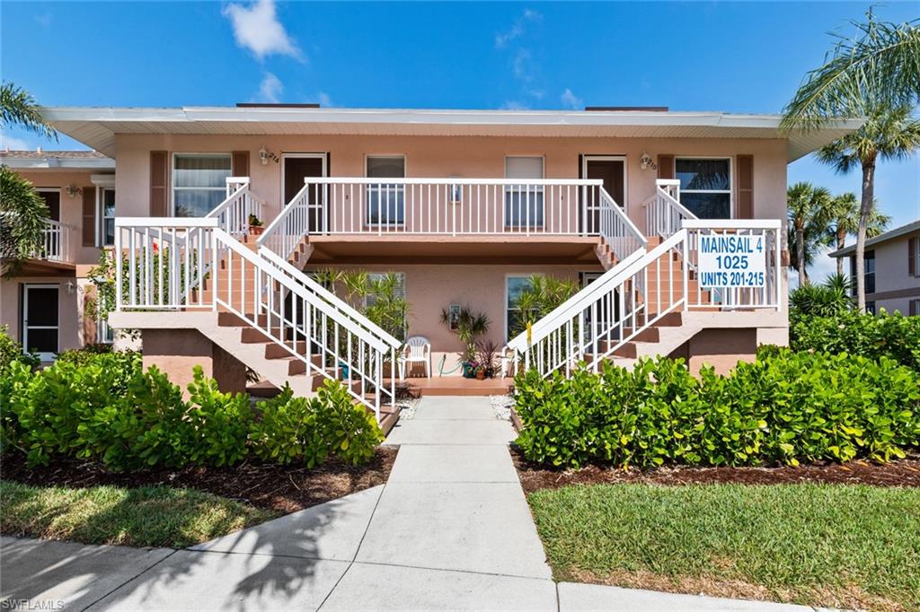 IMPECCABLE 2nd floor 2BR/2BA beauty that showcases a wide open water view! Nature lovers will appreciate this serene preserve setting. The impressive kitchen presents beautiful custom cabinetry, granite, and stainless appliances. Tile flooring set on a diagonal extends into the DR and LR that feature beautiful finishes and furnishings. Step out into the tiled/screened lanai, the perfect setting for enjoying a colorful sunset. Practical features include manual storm shutters and a washer and dryer. French doors open into the guest bedroom with custom built-ins. The master suite offers French doors that open out to the lanai and a walk-in closet. Mainsail offers 2 waterfront pools (one of which is screened), tennis courts and assigned parking.This is South West Florida Coastal Living to enjoy, the water views and be close to nature with scenic sights of Rookery Bay.  Whether it be watching the sea birds, or jumping fish, you will ENJOY this get away home.  Views from screened in Lanai, Master Bedroom, and open living areas. 2 bedroom and 2 bath give ample space for relaxing. Close to Marco and Naples for shopping, dining and just 5.5 miles to Marco Islands Tigertail Beach