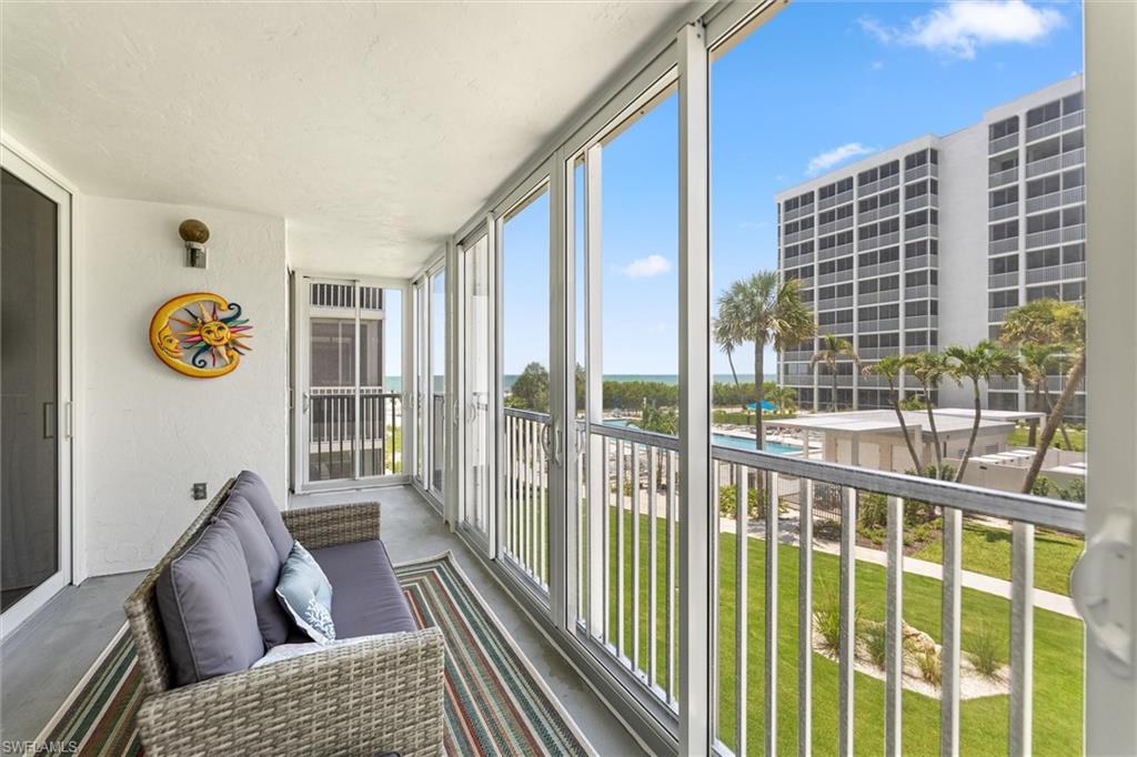 Experience coastal living in this lovely beachfront condo at Creciente.  This residence offers stunning, Gulf-front views and breathtaking sunsets from your private balcony overlooking the beach and pool. Designed with an open-concept layout, the living space flows seamlessly to the balcony, with both bedrooms also enjoy direct balcony access—perfect for soaking in the sea breeze and scenery. This condo is being sold turnkey, making it move-in or rental-ready from day one.  New tile flooring, new interior and exterior sliders, recently painted, and new dishwasher and washing machine make this condo very desirable with major improvements already finished! Enjoy the convenience of covered garage parking, adding ease and security to your beachfront lifestyle. Ideally located directly across from the revitalized Santini Plaza, now thriving again with a growing mix of restaurants, shops, a hardware store, and UPS. Everyday essentials are just steps away with 7-Eleven and CVS nearby. Whether you're seeking a full-time residence, vacation getaway, or investment opportunity, this condo delivers the perfect blend of luxury, location, and lifestyle.