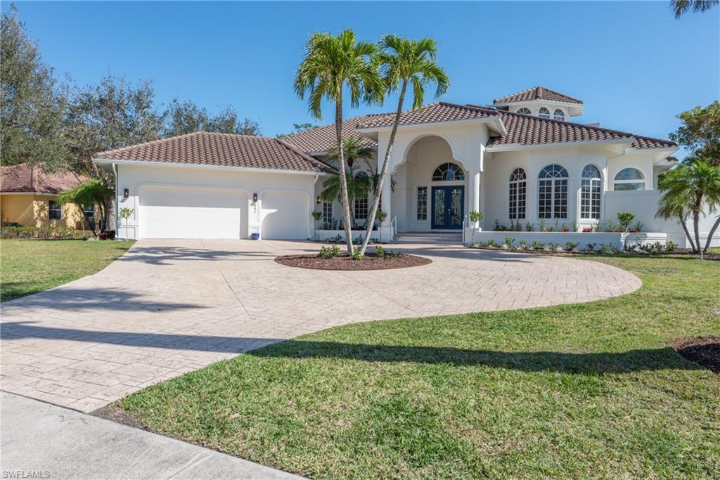 Beautiful coastal residence in the heart of the estates of Marco Island with numerous brand new upgrades throughout!  Built by Slocum-Christian, this stately 4 bedroom & 3-1/2 bathroom home offers a spacious great room floor plan, features grand ~20' high ceilings, a magnificent outdoor lanai & pool area all on a half acre of land for your enjoyment! Newly transformed with new furniture in/out, brand new roof, new gutters, all new paint (inside & outside), new lighting/fans, new LED lighting, new carpeting, new dishwasher/microwave/washer/dryer, new Hunter Douglas sun shades in great room, new thermostats, epoxy flooring in the garage, new landscaping, sprinklers and more!  The massive swimming pool/spa/outdoor kitchen/lanai is one of the finest out there & was completely renovated with new equipment, new screens, new pool deck and now it is a salt water system to complete this fabulous coastal package.   You'll enjoy the light & bright living room, kitchen with breakfast bar, massive primary bedroom suite, comfy guest suites, large laundry room w/ extra storage & 2nd floor space that could be used as an office/guest loft w/ exterior patio lookout!