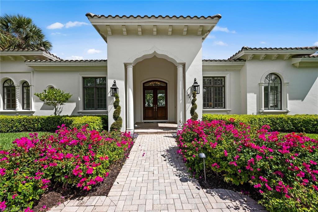 Upon entering this stunning Quail West residence, you'll be greeted by an immediate sense of openness, brightness, and warmth. The thoughtful layout and pristine condition of the home creates an inviting atmosphere that is ideal for modern living.  Highlighted by an expansive great room with a large chef’s kitchen and adjacent formal living room that both feature striking views of the luxurious pool area through walls of oversized windows.  The owner's suite is generously proportioned, featuring dual walk-in closets and sliding doors that also connect to the exquisite outdoor area and pool. For further versatility, the spacious office could be utilized as a potential fourth bedroom. Outdoors, there is a large fenced-in yard, covered lanai, and a sprawling pool deck with spectacular golf course views.

Recent upgrades encompass a new roof, a kinetic water system, updated air conditioning units and condensers, fresh paint, upgraded appliances, and a new pool pump and heater. Nestled within the prestigious Quail West community, this residence grants access to two championship golf courses, racquet sports facilities, multiple dining venues, a state-of-the-art two-story fitness center, and a comprehensive salon for all your needs. The added bonus are the transferable golf and beach memberships which are available, enhancing its appeal.