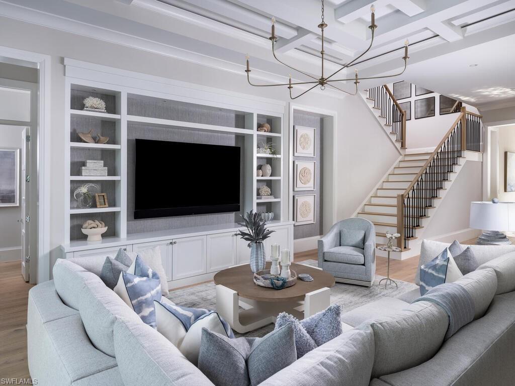 575 Pine Grove Lane is a rare opportunity to purchase a brand-new, completely finished and furnished home built by Borelli Construction of Naples, Park Shore's premier luxury builder. Design and furnishings by R & Co. Designs. This move-in ready home is stunning from every angle. The expansive great room greets you with pool & spa views. The functional kitchen & wet bar feature double islands, a Wolf range top, double ovens, SubZero refrigerator, wine fridge, beverage fridge, Cove dishwasher and galley sink. The working pantry includes a microwave, second dishwasher and refrigerator. High end finishes throughout include white oak wood flooring, marble tile, European style wood cabinetry, 12" baseboards, electric shades, linear AC vents hidden in intricate ceiling details, Crestron home and lighting automation, built-in speakers, custom closet systems, and many custom designer details. Enjoy sunset views from balcony. The home is built to last with concrete block exterior, metal roof trusses, spray foam insulation, Andersen windows, Euro-Wall sliders and moisture-resistant dry wall. A 1,000 gallon underground propane tank fuels many appliances and a whole-house Kohler generator.