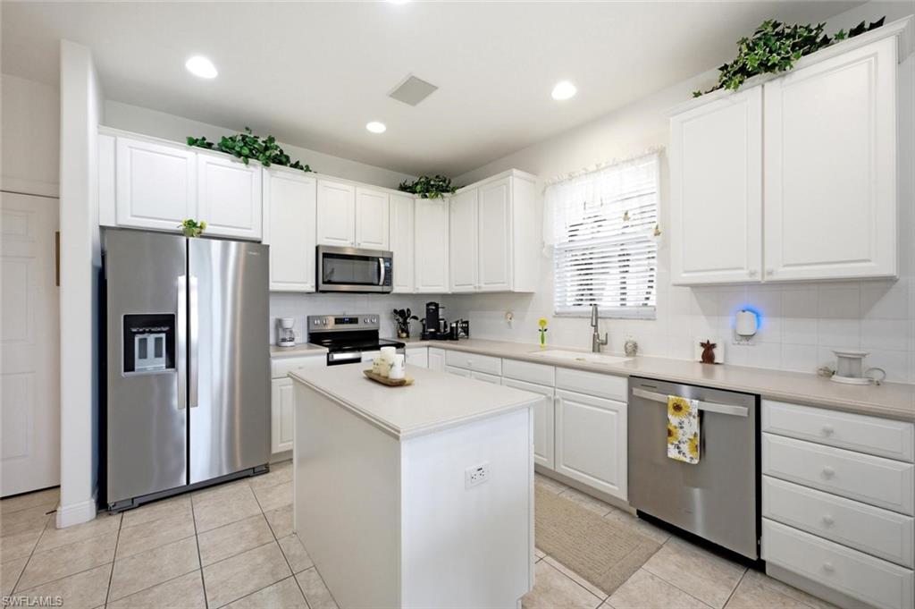 Experience the best of bundled golf living at Naples Lakes Country Club, home to the only Arnold Palmer Signature Golf Course in Naples! This beautiful, light-filled first-floor coach home offers nearly 2,100 square feet of thoughtfully designed living space with 2 bedrooms, 2 full bathrooms, a spacious den, and an attached 2-car garage.

Proudly offered by its original owner, this meticulously maintained, unfurnished, move-in-ready residence is attractively priced and ready for your personal touch. The open floor plan features a desirable split-bedroom layout, a spacious walk-in pantry, new kitchen appliances, generous living and dining areas, and abundant natural light throughout.

Step onto the expansive screened lanai and take in the picturesque views of the lake and the 17th hole—an ideal setting for morning coffee, entertaining guests, or simply relaxing at the end of the day.

Golf membership is included with the purchase, providing immediate access to the championship Arnold Palmer Signature golf course, along with outstanding amenities including a beautifully renovated clubhouse, resort-style pool, fitness center, tennis, pickleball, bocce, and an active social calendar featuring Mah Jongg, Euchre, Bridge, card groups, dining events, and countless activities throughout the year.

Ideally located just minutes from the white-sand beaches of Naples, Fifth Avenue South’s premier shopping and dining, Marco Island, and approximately 30 minutes from RSW International Airport in normal traffic, this exceptional coach home offers the perfect combination of luxury, convenience, and the Southwest Florida lifestyle.
