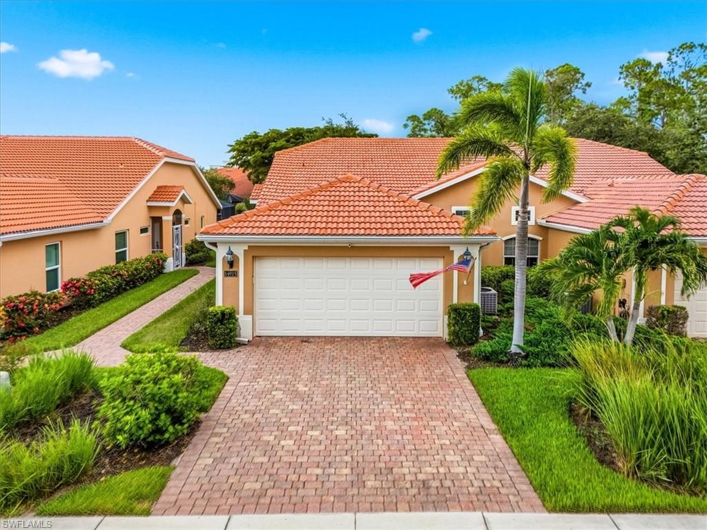 Welcome Home to Tuscany Cove – Villa Living That Feels Like Single-Family
Tucked on a quiet cul-de-sac in one of North Naples' most desirable gated communities, this beautifully maintained 3-bedroom, 2-bath attached villa offers the space and privacy of a single-family home with the ease of maintenance-free living.
Step inside to a bright, open great room floor plan with soaring vaulted ceilings and tile flooring throughout — no carpet anywhere. The eat-in kitchen features a breakfast bar, pantry, and stainless steel appliances, flowing seamlessly into the dining and living areas, perfect for entertaining or relaxed everyday living. The primary suite offers a walk-in closet and renovated shower, while thoughtful upgrades throughout include updated fixtures, ceiling fans, and fresh paint.
Enjoy your morning coffee on the expanded screened lanai overlooking peaceful, private green space — no home directly behind you, just your own quiet slice of paradise. Additional highlights include impact-resistant windows throughout for storm protection and peace of mind, a tile roof, brick paver driveway, dedicated laundry room, and a two-car attached garage.
Tuscany Cove is a gated, pet-friendly community loaded with resort-style amenities: a sparkling community pool, fitness center, tennis and basketball courts, play area, and clubhouse — all just a short stroll from your front door. And you're minutes from top-rated schools, shopping, dining, healthcare, and the world-famous beaches of Naples, Florida.