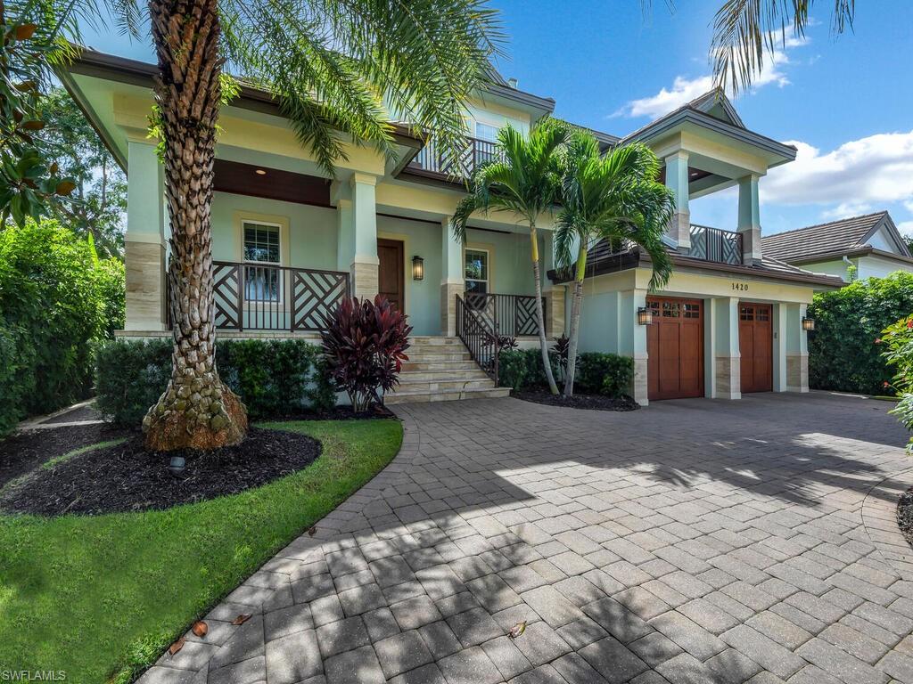This Waterfront Gulf Access custom built home is an architectural beauty that recently won several Sanddollar awards for design and quality. The builder‘s attention to detail shows throughout this masterpiece. The home features a spacious great room with 20' Ceilings, fireplace and walk around balcony. The kitchen has rich custom wood cabinets, granite countertops, Thermador stainless steel appliances, two dishwashers, center island cabinets with Bar sink and 8 burner gas stove with two ovens. Just off the dining room is a climate controlled wine closet to please any collector. There are 4 bedrooms, 4 1/2 Baths, Den-Study, Entertainment Room and Formal Dining Room. An Open Pool with Spa is the focal point of outdoor coastal living. Patio ha retractable screens . The dock area can accommodate a larger vessel and also has 12,000 lb lift. There is a Covered second floor balcony/lanai that overlooks the pool and canal with breath taking views of Naples Bay, with a Pool Table, fire pit and entertainment lounge area. The home is less than a mile from downtown 5th Ave. and is situated just a few homes from Naples Bay leading out to the Gulf of Mexico. There are too many features to list.
