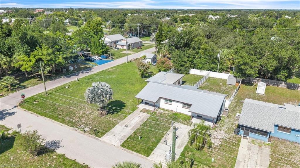 Exceptional investment opportunity in the heart of Arcadia! This well-maintained duplex sits on a spacious 0.42-acre lot and includes an additional bonus lot, offering endless possibilities for future use or expansion. With one unit currently occupied and the other vacant, this property is ideal for investors looking for immediate rental income while having the flexibility to owner-occupy or lease the second unit. Unit 311 features 3 bedrooms and 2 bathrooms, while Unit 313 offers 2 bedrooms and 1 bathroom. Both units have bright, airy interiors with open living spaces, stainless steel kitchen appliances, and private fenced backyards for added comfort and privacy. Additional updates include a durable metal roof installed in 2022 by Gopher Roofing, providing peace of mind for years to come. Whether you're expanding your investment portfolio or searching for an income-producing property with room to grow, this duplex is a fantastic opportunity in a convenient Arcadia location.