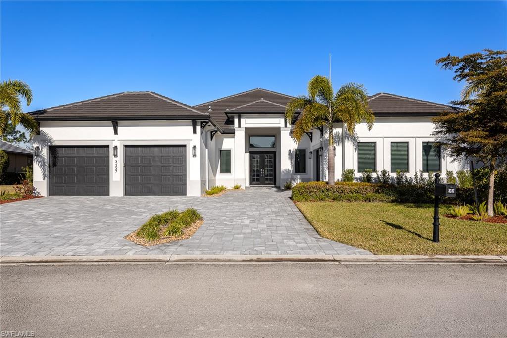 Experience luxury living at its finest in this stunning estate home, perfectly positioned within the exclusive River Hall Country Club community. Backing directly to the 1st hole, this immaculate residence offers breathtaking views and the ultimate blend of privacy and sophistication. Boasting just under 3900 square feet of beautifully designed living area, this three bedroom plus dedicated office space/fourth bedroom, three-and-a-half-bath home showcases exceptional craftsmanship and meticulous attention to detail throughout. The expansive floorplan is ideal for both everyday living and entertaining. At the heart of the home, the chef's kitchen is a true showstopper- thoughtfully designed with premium finishes including Thermador appliances and upgraded quartz countertops, abundant workspace, and ample storage to inspire culinary creativity. Flow seamlessly into the spacious living and dining areas, where natural light enhances the home's elegant ambiance. Step outside to your outdoor oasis featuring a sparkling pool and relaxing hot tub, all set against the serene backdrop of the golf course- perfect for hosting guests or unwinding after a long day. Car enthusiasts and hobbyists will appreciate the oversized two-car garage with soaring ceilings, complemented by a tandem oversized one-car garage offering exceptional flexibility for additional vehicles, storage, or a workshop. This remarkable estate home delivers the lifestyle you've been waiting for- luxury, comfort and a fabulous location- all in one extraordinary property!